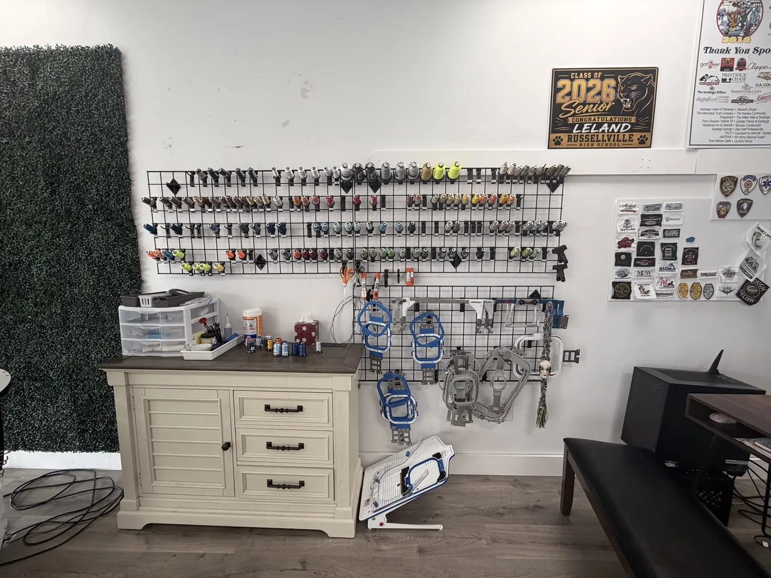 Products and custom items displayed inside Phoenix Printing and Signs